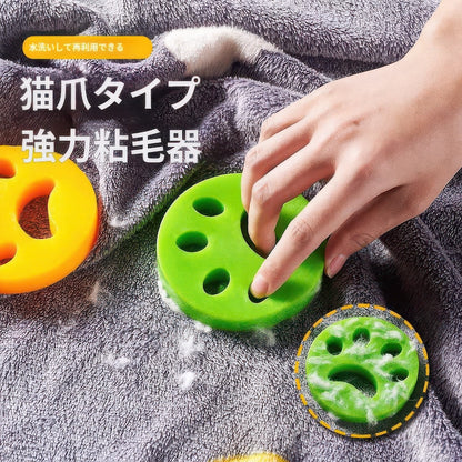 タオルや布製品についた猫の毛を強力な粘着力で取り除く手動使用の肉球型集毛器